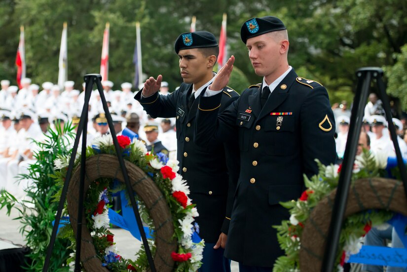 7th Transportation Brigade (Expeditionary) Soldiers salute after placing a wreath during a 9/11 memorial ceremony at the Victory Arch in Newport News, Va., Sept. 11, 2016. Being that unity was a central theme of the ceremony, a joint Honor Guard comprised of the U.S. Navy, Joint Base Langley-Eustis, and Newport News Fire, Police, and Sheriff's Departments laid wreaths and presented the colors during the ceremony. (U.S. Air Force photo by Staff Sgt. J.D. Strong II)