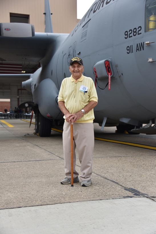 Guy Prestia, 94, stands in front of a C-130 Hercules for a photo at a Veterans Breakfast Club event at the 911th International Airport Air Reserve Station, Pa., Sept. 9, 2016. Prestia was drafted in the Army in 1942 as an infantryman with the 45th Infantry Division. (U.S. Air Force photo by Airman 1st Class Bethany Kobily)