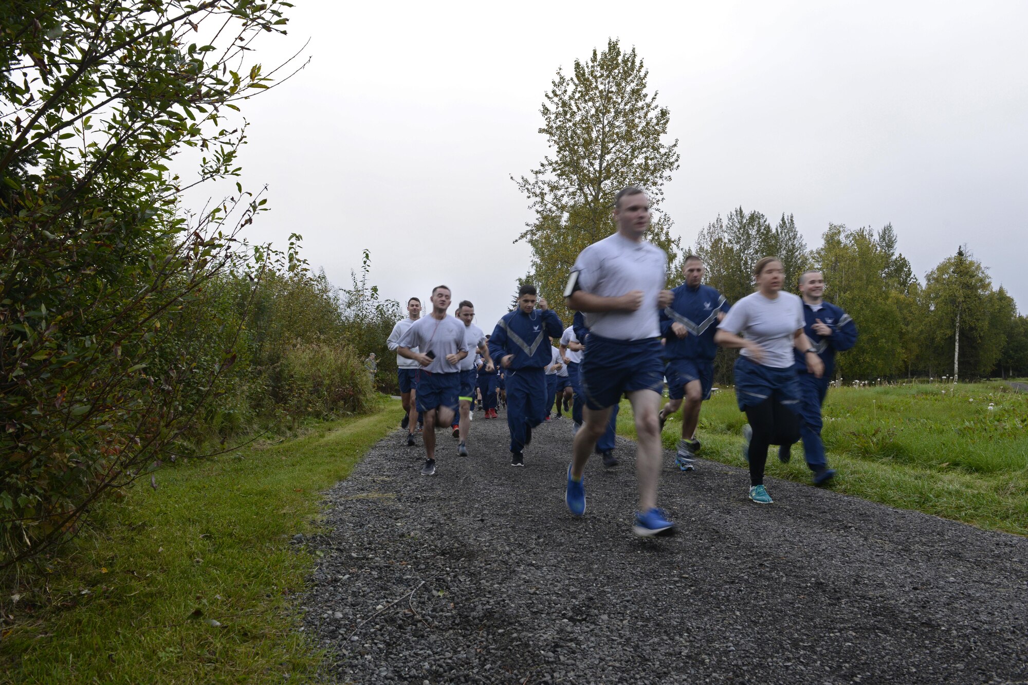 Airmen participate in the Run to be Ready 5K at the Eagleglen Fitness Park at Joint Base Elmendorf-Richardson, Alaska, Sept. 9, 2016. The event was hosted to raise awareness for National Preparedness Month and emergency kits were given as prizes to the top male and female finishers.