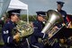 Air Force Staff Sgt. Renee Parcell plays the French horn and Airman 1st Class Justis MacKenzie plays the tuba as the Wright Brass performs the National Anthem at the Great Wright Brothers Aero Carnival on Huffman Prairie Flying Field at Wright-Patterson Air Force Base, Ohio, Sept. 10, 2016. The ensemble, part of the U.S. Air Force Band of Flight, performed a short set of music to entertain the visitors to the annual event. (U.S. Air Force photo / R.J. Oriez)