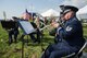 Air Force Tech. Sgt. Cheryl Przytula and the Wright Brass perform at the Great Wright Brothers Aero Carnival on Huffman Prairie Flying Field at Wright-Patterson Air Force Base, Ohio, Sept. 10, 2016. The annual event, at the site the Wright Brothers learned to fly, celebrated the role the area played in early aviation. (U.S. Air Force photo / R.J. Oriez)