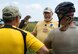 Ruby, a red tail hawk, and William Masterson, Five Rivers MetroParks, visit with some of the guests who came out to the Great Wright Brothers Aero Carnival on Huffman Prairie Flying Field at Wright-Patterson Air Force Base, Ohio, Sept. 10, 2016. Ruby, as well as a working sheepdog demonstration, were part of the annual event celebrating the area’s aviation history. (U.S. Air Force photo / R.J. Oriez)