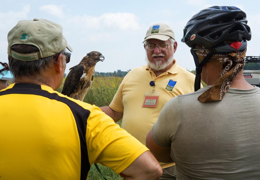 Ruby, a red tail hawk, and William Masterson, Five Rivers MetroParks, visit with some of the guests who came out to the Great Wright Brothers Aero Carnival on Huffman Prairie Flying Field at Wright-Patterson Air Force Base, Ohio, Sept. 10, 2016. Ruby, as well as a working sheepdog demonstration, were part of the annual event celebrating the area’s aviation history. (U.S. Air Force photo / R.J. Oriez)