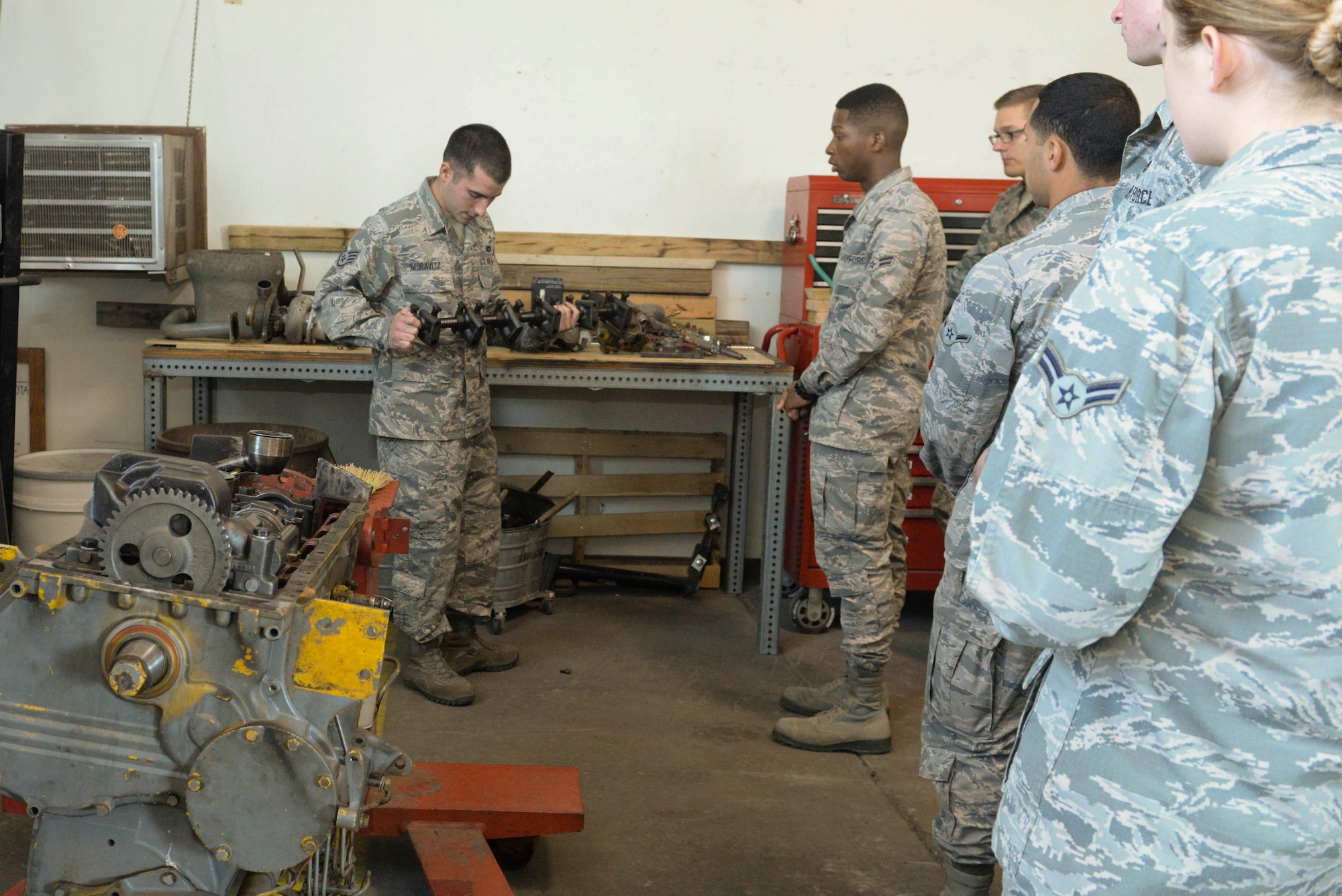 Staff Sgt. Daniel Moravitz, an electrical power production journeyman assigned to the 5th Civil Engineer Squadron, conducts component familiarization training at Minot Air Force Base, N.D., Sept. 12, 2016. The ‘power pro’ shop maintains generators around base to ensure mission essential buildings and operations are running. (U.S. Air Force photo/Airman 1st Class Jessica Weissman)