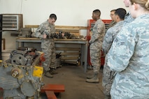 Staff Sgt. Daniel Moravitz, an electrical power production journeyman assigned to the 5th Civil Engineer Squadron, conducts component familiarization training at Minot Air Force Base, N.D., Sept. 12, 2016. The ‘power pro’ shop maintains generators around base to ensure mission essential buildings and operations are running. (U.S. Air Force photo/Airman 1st Class Jessica Weissman)