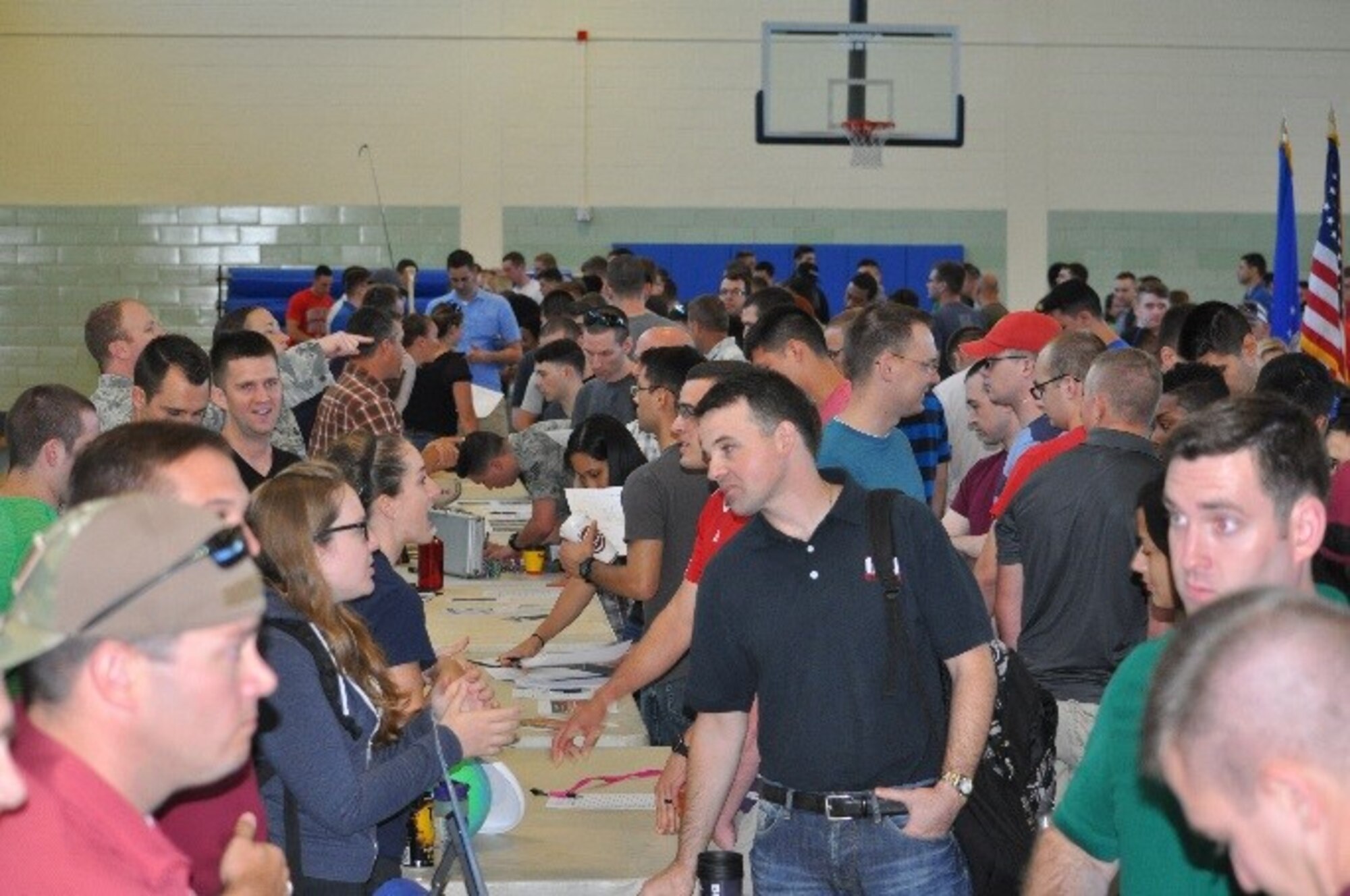 More than 400 Airmen from the 480th Intelligence, Surveillance, and Reconnaissance Group visiting activity booths to meet people and discuss what the activities were available during the Comprehensive Airmen fitness program, at Fort Gordon, Ga, July 27, 2016. The main goal was to get all Airmen together who have common interests in hopes of building better relationships and meeting others that they may not have known from other units. (U.S. Air Force/courtesy photo)