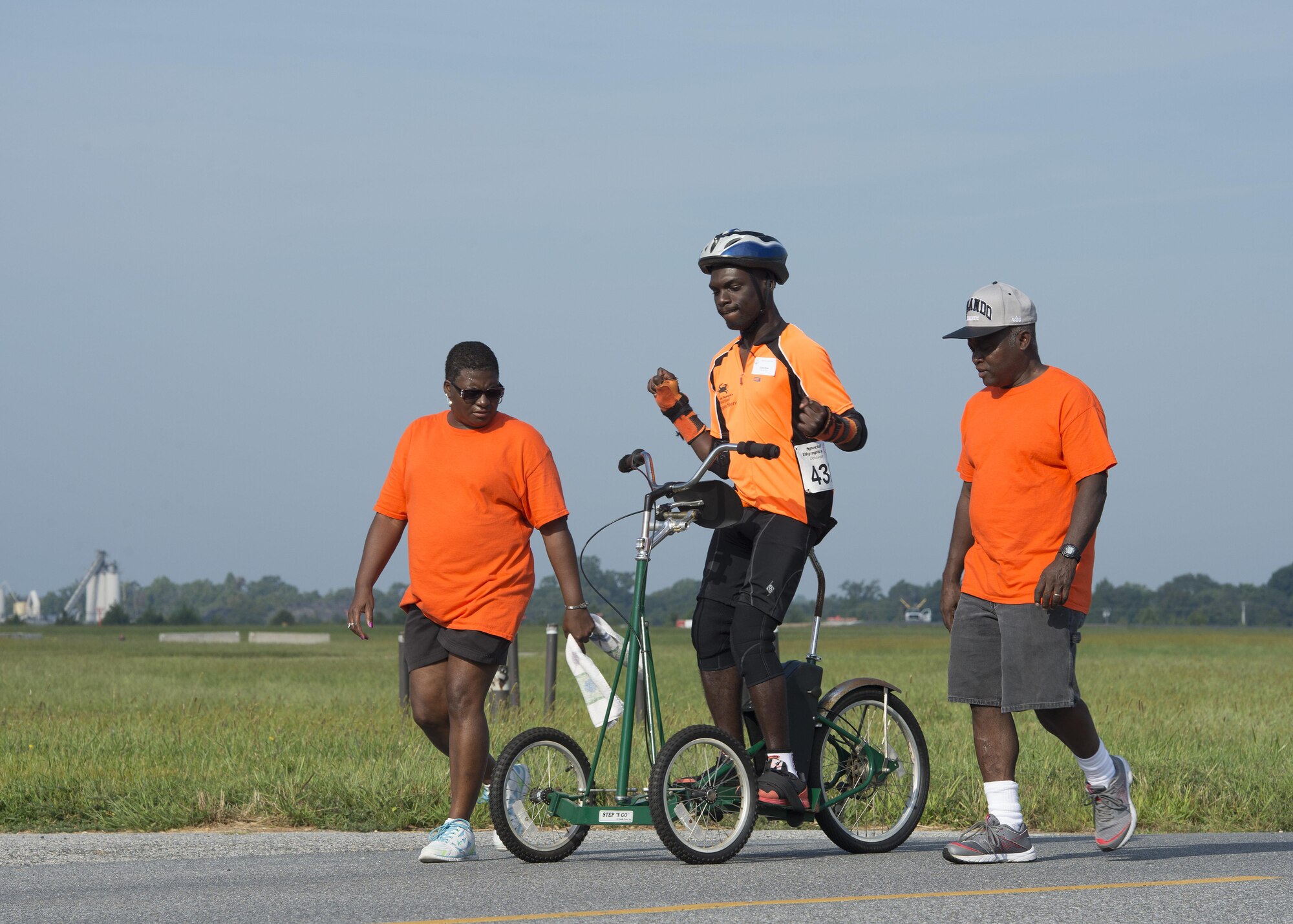 Corey Bryan, Upper Shore athlete, takes a warm-up lap on his stand-up bicycle prior to the start of the Special Olympics Delaware 2016 Cycling Classic Sept. 10, 2016, at Dover Air Force Base, Del. SODE and Dover AFB have had an ongoing relationship since 1993. (U.S. Air Force photo by Senior Airman Zachary Cacicia)