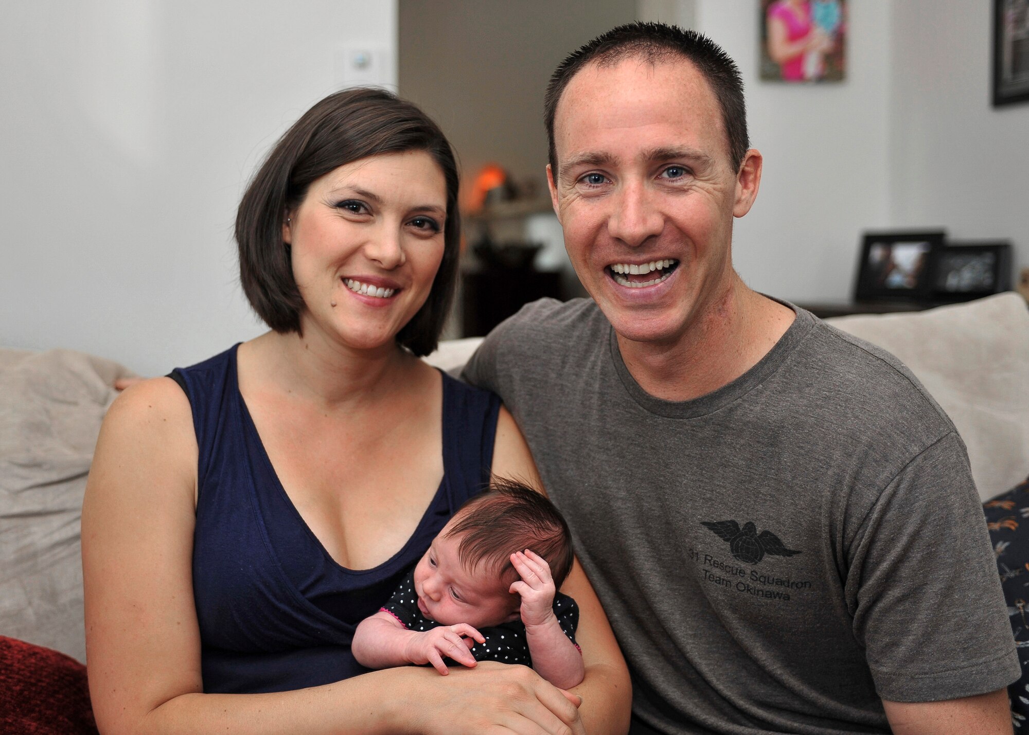 U.S. Air Force Master Sgt. Travis Shaw, Air Combat Command, pararescue specialist helped his wife Shalina deliver their daughter Clara Aug. 9, 2016, at their home in Yorktown, Va. According to Shaw, pararescue specialist, or PJs, receive some obstetrics and gynecology experience during paramedic training, but their primary focus is on trauma relating to search, rescue, and personnel recovery. (U.S. Air Force photo by Tech. Sgt. Katie Gar Ward)