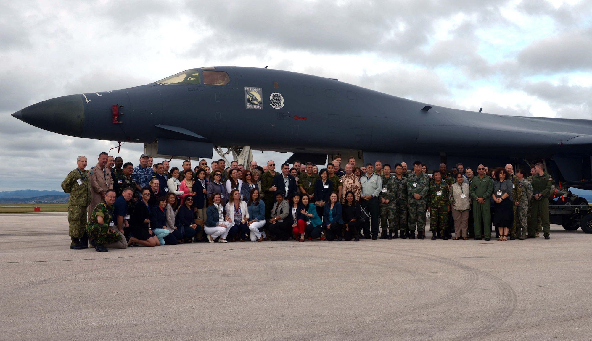 Members of a delegation of foreign Attachés stand for a group photo in front of a B-1 bomber at Ellsworth Air Force Base, S.D., Sept. 12, 2016. The group included more than 30 senior officers from a multitude of countries, including China, the Netherlands and Canada. (U.S. Air Force photo by Airman 1st Class Donald C. Knechtel)