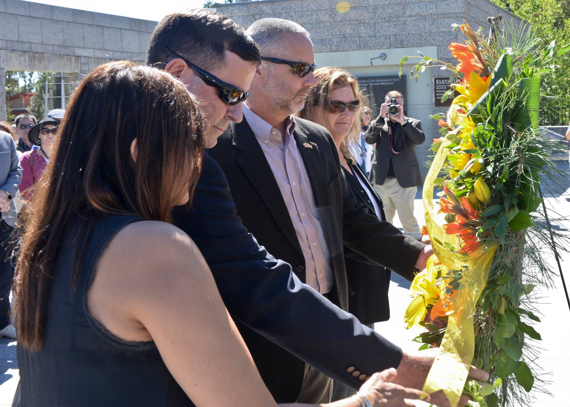 Senior foreign and U.S. attachés lay a wreath at the Mount Rushmore National Memorial, S.D., Sept. 11, 2016, on behalf of the Foreign Defense Attaché Corps. The wreath laying ceremony was conducted in honor of the 15th anniversary of the attacks on Sept. 11, 2001, that occurred in New York, Virginia and Pennsylvania. (U.S. Air Force photo by Senior Airman Anania Tekurio)