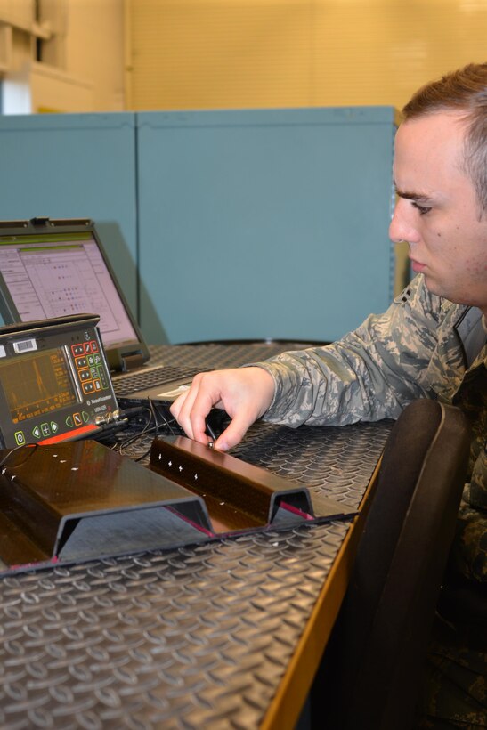 An Air Force Airman from the 3rd Maintenance Squadron Non Destructive Inspection Flight, performs special inspections on aircraft parts Sept. 13, 2016 at Joint Base Elmendorf-Richardson, Alaska. 
USAF Photo by Staff. Sgt. Michael Campbell.