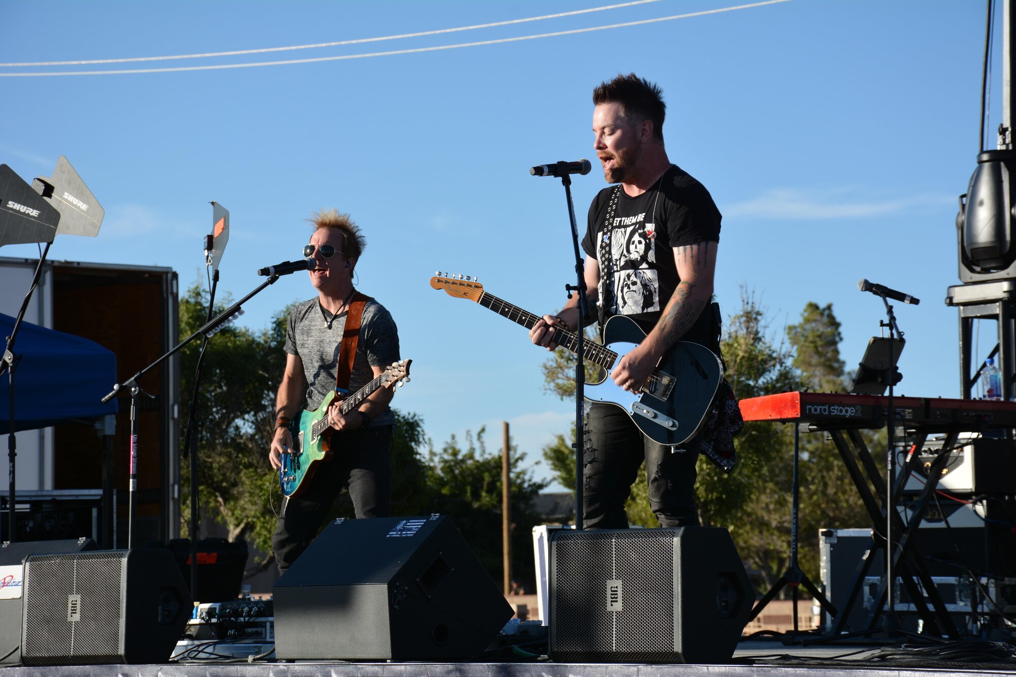 David Cook, the American Idol Season Seven winner, and his band perform a song at Holloman Air Force Base, N.M. on Sept. 11, 2016. The 49th Force Support Squadron hosted the event, which is Cook’s 10th Air Force Base he has visited on this tour. (U.S. Air Force photo by Staff Sgt. Warren Spearman)