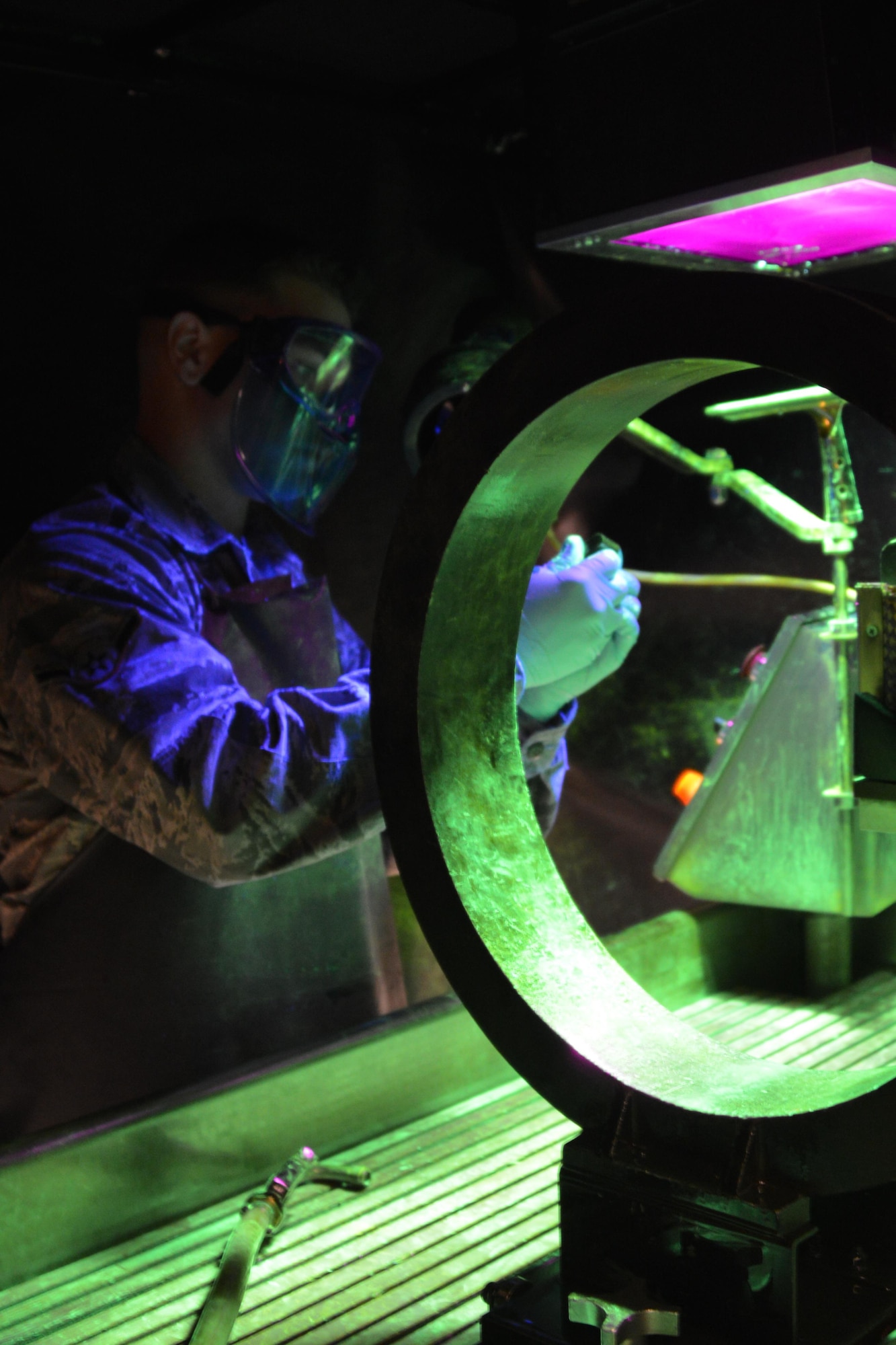 Air Force Airman Jacob King from the 3rd Maintenance Squadron Non Destructive Inspection Flight, performs special inspections on aircraft parts Sept. 13, 2016 at Joint Base Elmendorf-Richardson, Alaska. 
USAF Photo by Staff. Sgt. Michael Campbell.