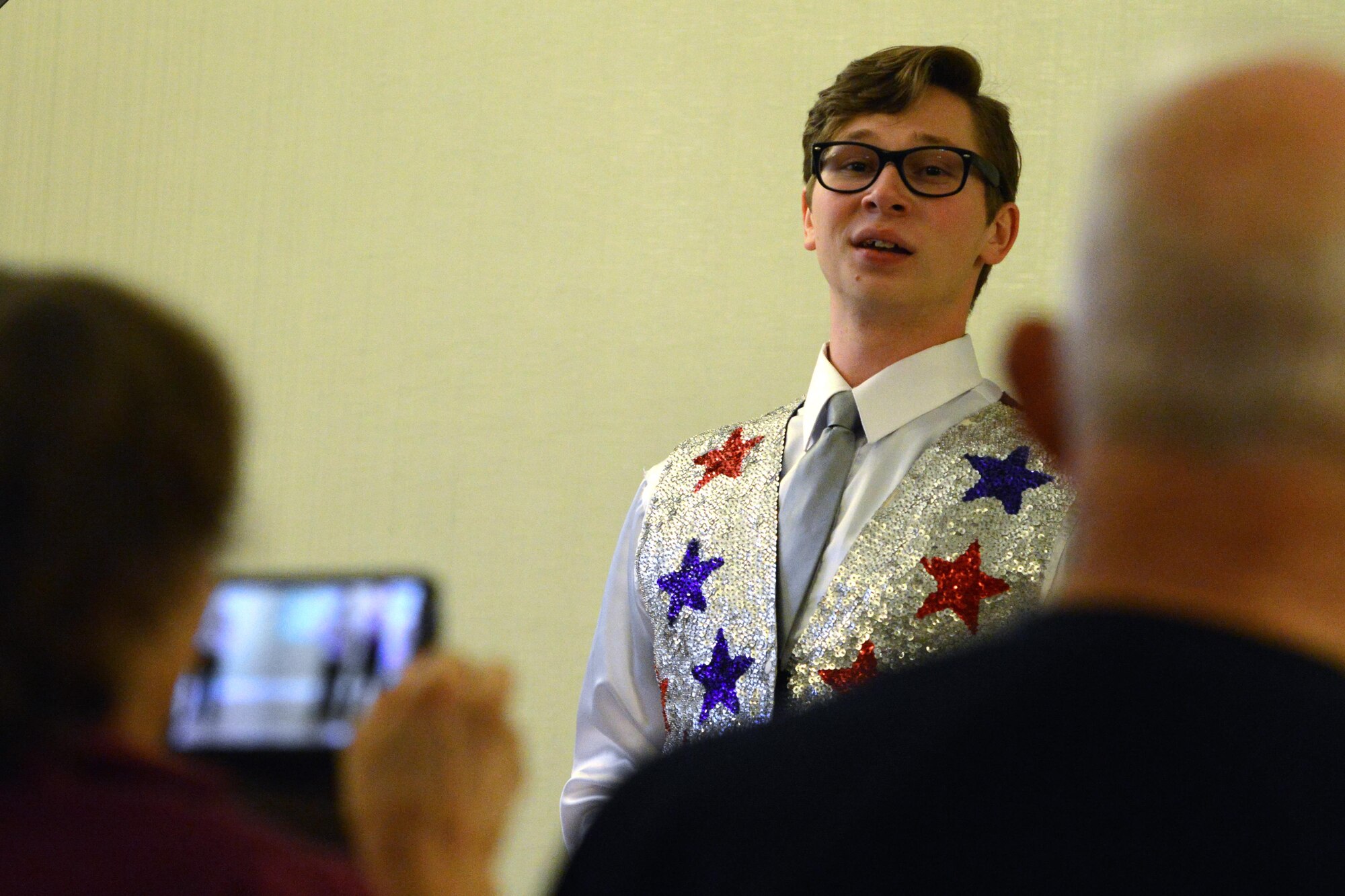 Camden Choplick, a Re-Creation USA performer, sings at the Alaska Fisher House at Joint Base Elmendorf-Richardson, Alaska, Sept. 9, 2016. The group’s performance was their first ever at a Fisher House.
