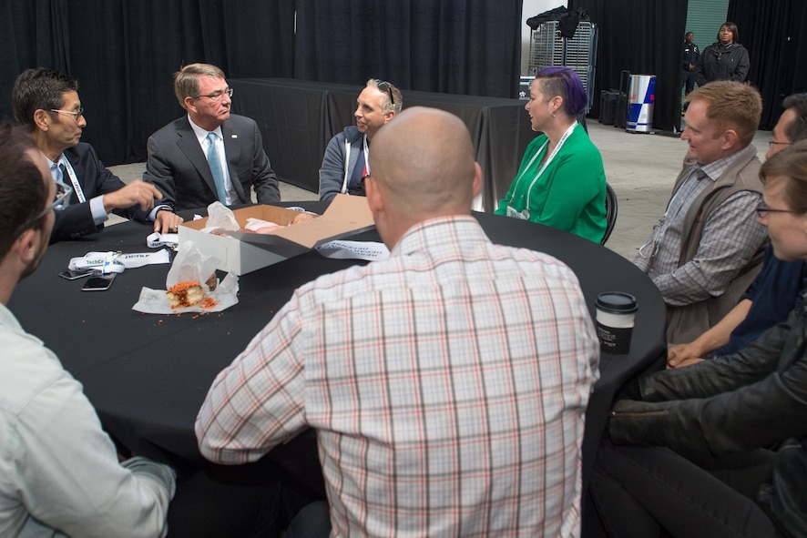 Defense Secretary Ash Carter speaks with Defense Digital Services team members during the TechCrunch Disrupt innovation and technology conference.