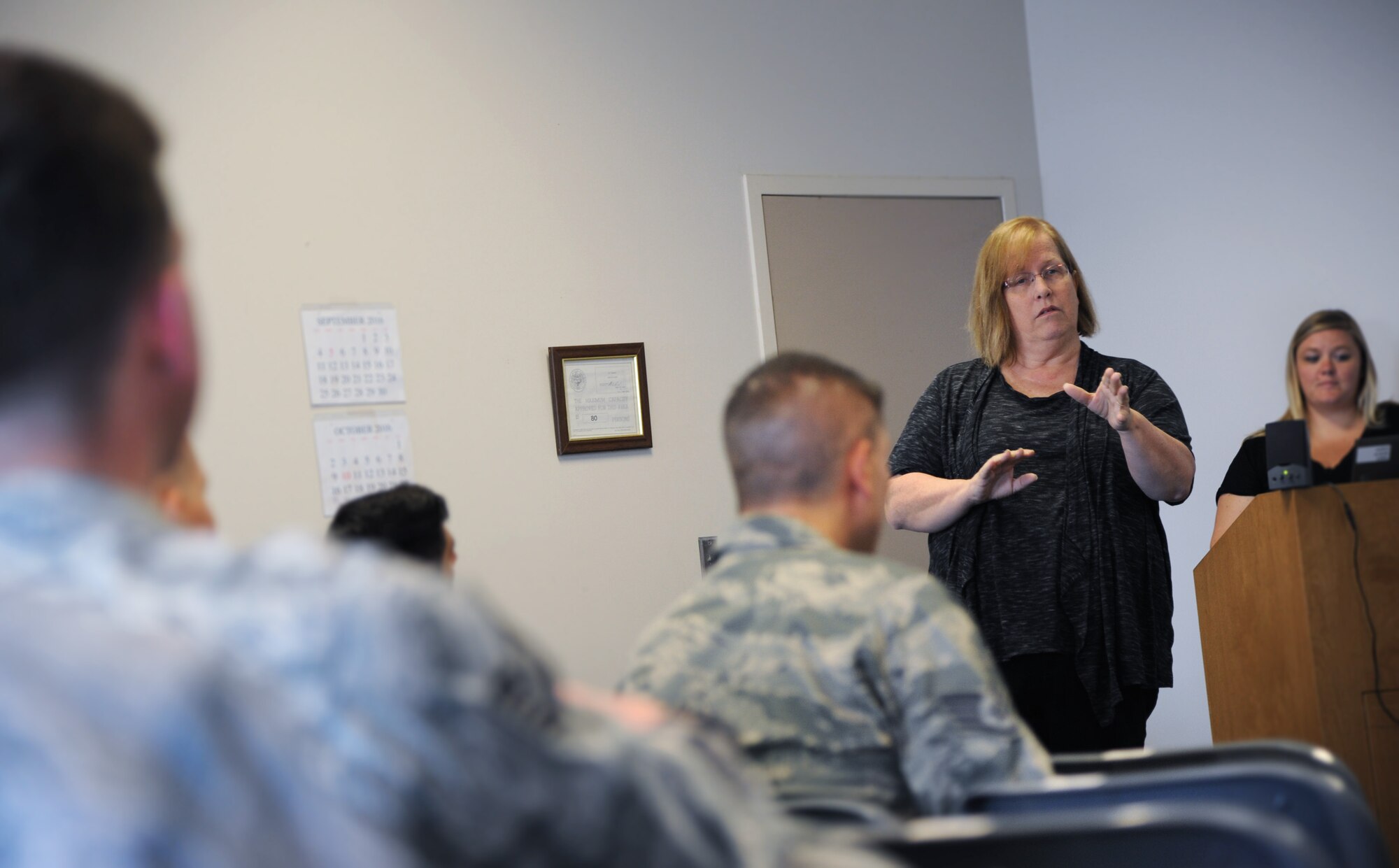 Answering questions from Airmen of the 142nd Fighter Wing during the monthly Wing Diversity and Inclusion Counsel meeting, Portland Air National Guard Base, Ore., Sept. 11, 2016, Jenn Burleton, executive director for TransActive Gender Center, Portland, right, discussed some of the changes regarding transgendered service members with recent DoD policies. (U.S. Air National Guard photo by Tech. Sgt. John Hughel, 142nd Fighter Wing Public Affairs/Released)