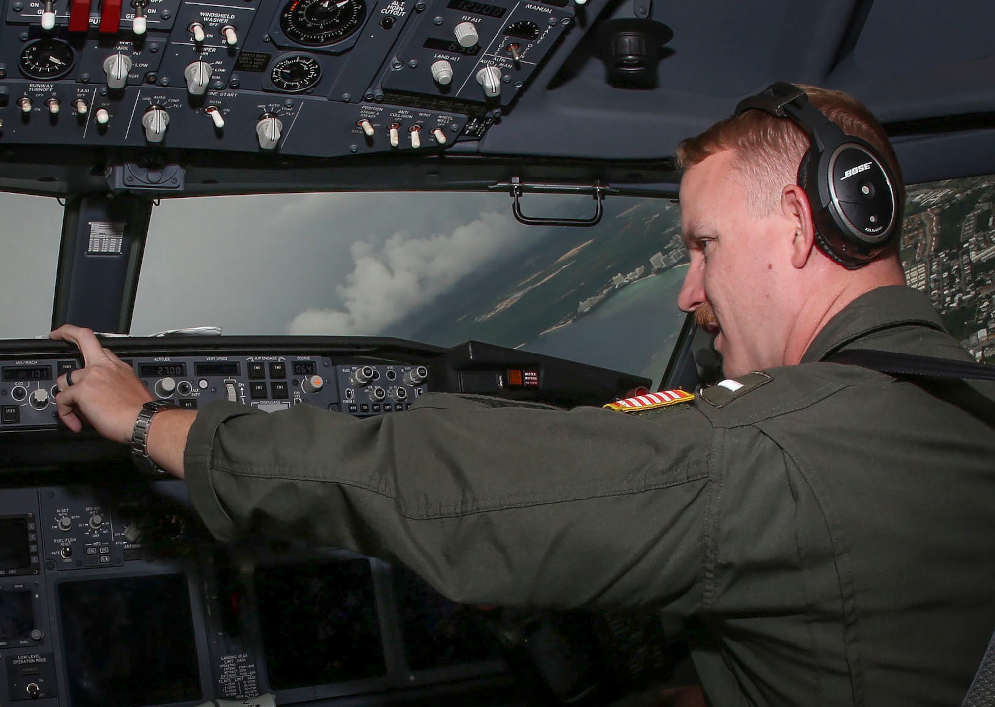 A U.S. Navy pilot assigned to Patrol Squadron Eight (VP-8) provides range clearance for a Sinking Exercise during Valiant Shield 16, off the coast of Guam, Sept. 13, 2016. Units from the U.S. Navy, Air Force and Marine Corps provided live fire from ships and aircraft in order to sink the decommissioned USS Rentz (FFG 46). Conducting these types of joint training events provides service members the opportunity to improve communication while gaining proficiency in tactics, targeting, and live firing against a surface target at sea. VS16 is a biennial, U.S.–only, field-training exercise that focuses on training all services to increase interoperability and working relationships. (U.S. Marine Corps photo by Sgt. Jessica Quezada)