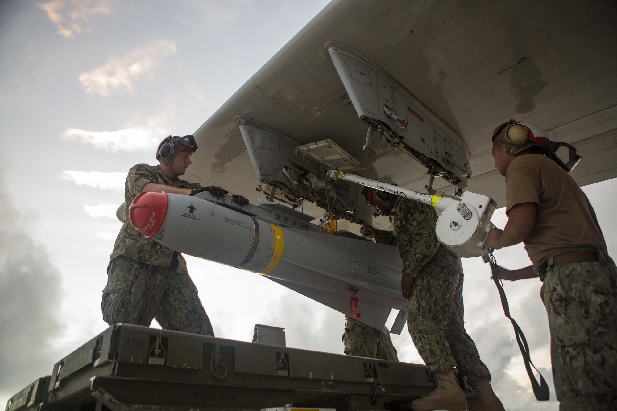 U.S. Navy sailors of Patrol Squadron 46 load a P-3 Orion aircraft with AGM-65F MAVERICKS Air to Surface Missiles prior to a sinking exercise Sept. 13, 2016, at Andersen Air Force Base, Guam, during Valiant Shield 2016. SINKEX provided service members the opportunity to gain proficiency in tactics, targeting, and live firing against a surface target at sea. Valiant Shield is a biennial, U.S. -only field-training exercise with a focus on integration of joint training among U.S. forces. (U.S. Marine Corps photo by Sgt. Justin Fisher)
