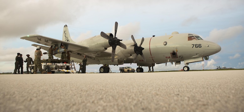 U.S. Navy sailors of Patrol Squadron 46 load a P-3 Orion aircraft with AGM-65F MAVERICKS Air to Surface Missiles prior to a sinking exercise Sept. 13, 2016, at Andersen Air Force Base, Guam, during Valiant Shield 2016. SINKEX provided service members the opportunity to gain proficiency in tactics, targeting, and live firing against a surface target at sea. Valiant Shield is a biennial, U.S. -only field-training exercise with a focus on integration of joint training among U.S. forces. (U.S. Marine Corps photo by Sgt. Justin Fisher)