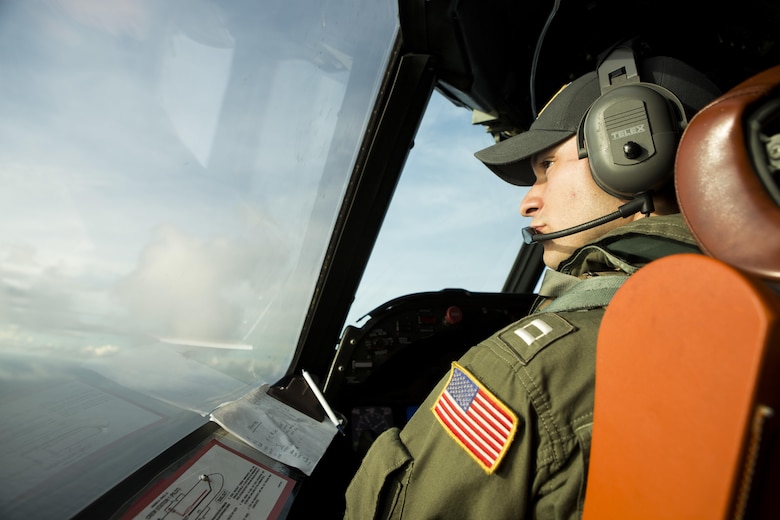 U.S. Navy Lt. Scott Keelan, a Patrol Squadron 46 pilot, operates a P-3 Orion aircraft during a sinking exercise Sept. 13, 2016, at Andersen Air Force Base, Guam, during Valiant Shield 2016. SINKEX provided service members the opportunity to gain proficiency in tactics, targeting, and live firing against a surface target at sea. Valiant Shield is a biennial, U.S. -only field-training exercise with a focus on integration of joint training among U.S. forces. (U.S. Marine Corps photo by Sgt. Justin Fisher)