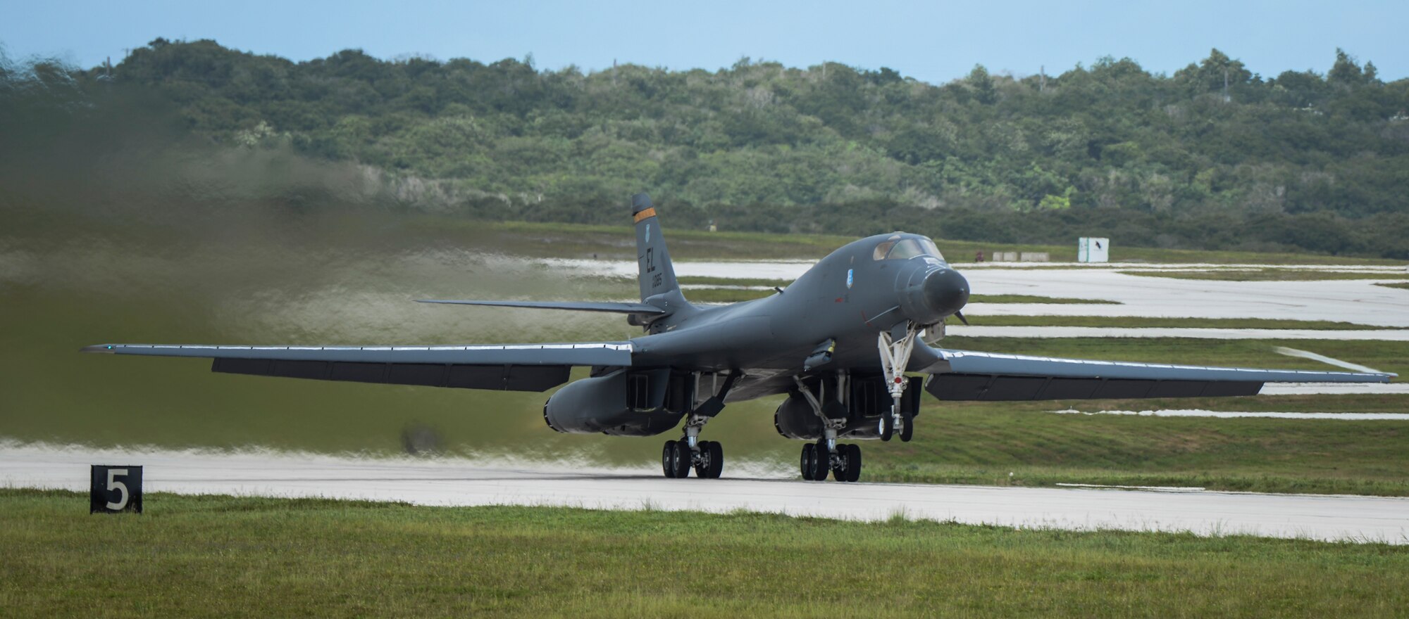 A B-1B Lancer assigned to the 34th Expeditionary Bomb Squadron, deployed from Ellsworth AFB, S.D., takes off during Exercise Valiant Shield at Andersen AFB, Guam, Sept. 14, 2016. Valiant Shield is a biennial U.S. Air Force, Navy and Marine Corps exercise held in Guam, focusing on real-world proficiency in sustaining joint forces at sea, in the air, on land and in cyberspace. (U.S. Air Force photo by Tech. Sgt. Richard P. Ebensberger)