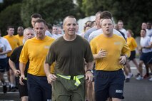 Maj. Gen. Charles Chiarotti, US Forces, Japan commander, leads the USFJ Command 5K Run at Yokota Air Base, Japan, Sept. 9, 2016. After the run, Chiarotti uncased the new USFJ command colors. (U.S. Air Force photo by Yasuo Osakabe/Released)