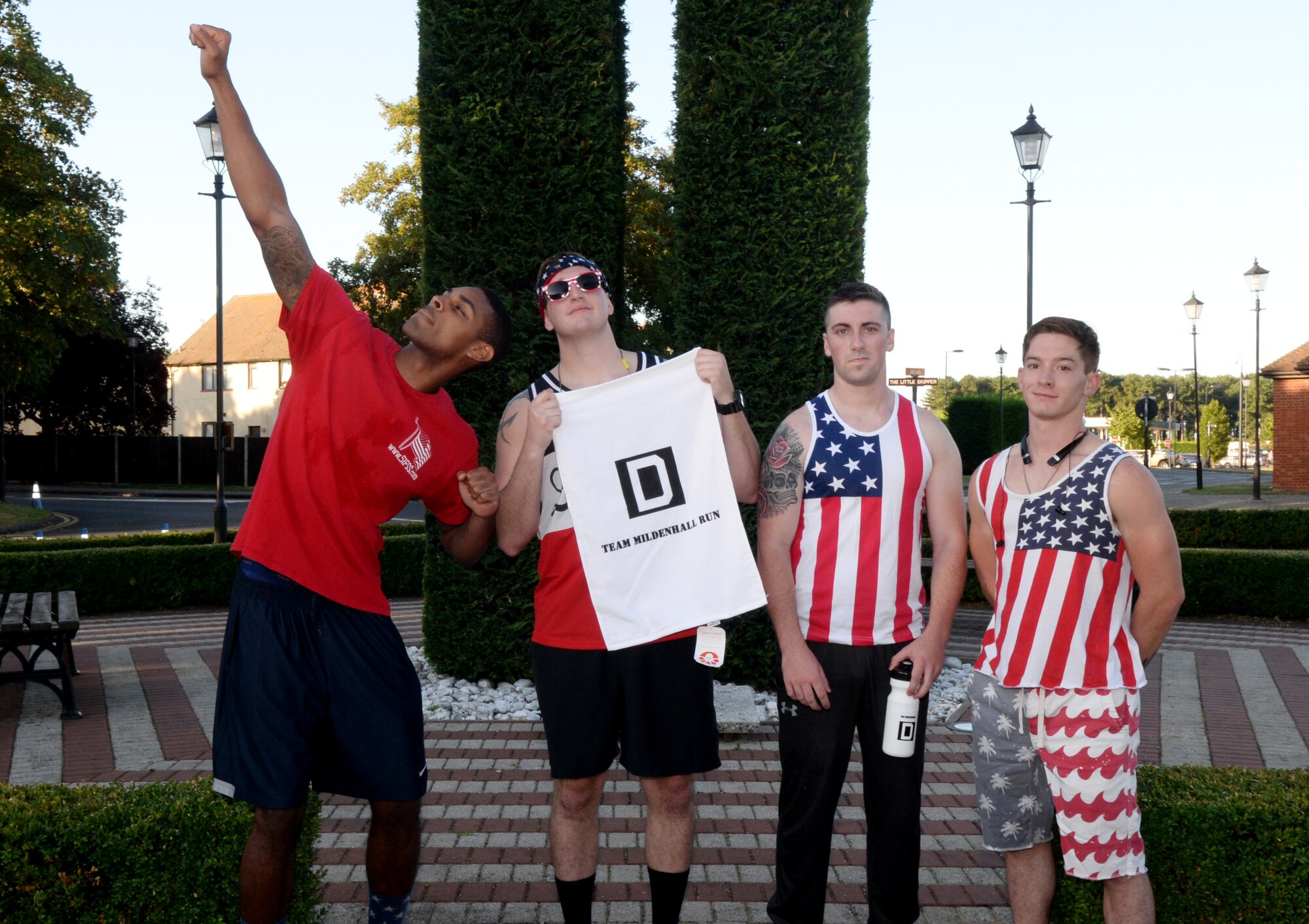 Four members of Team Mildenhall receive the most patriotic award following the Patriot Day 5K Sept. 9, 2016, on RAF Mildenhall, England. The event was held in remembrance of the victims and first responders who lost their lives Sept. 11, 2001. (U.S. Air Force photo by Airman 1st Class Tenley Long) 