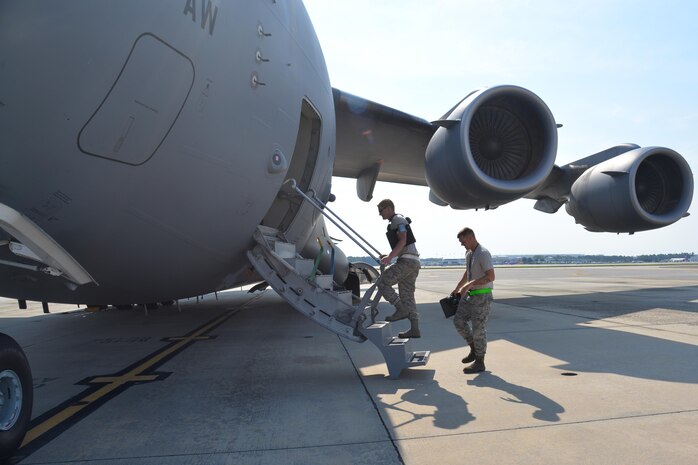 Staff Sgt. Alexander Ewing, Aersopace Ground Equipment inspector with the 437th Maintenance Group, and Staff Sgt. Ronald Robertson, Airplane General inspector, board a C-17 Globemaster III to perform Quality Assurance inspections on the flight line at Joint Base Charleston - Air Base, South Carolina on September 9, 2016. With programs like Quality Assurance in place, the 437th ensures that aircraft and military vehicles remain in safe working condition for the Joint Base Charleston mission. (U.S. Air Force photo/2nd Lt. Allison Egan)
