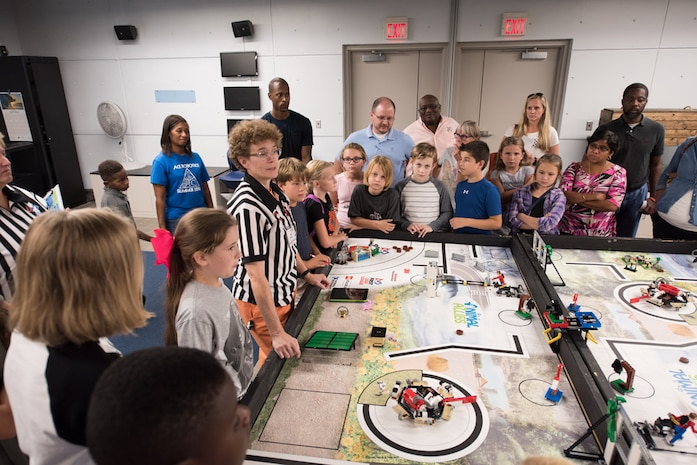 Approximately 350 students attended the 2016 Charleston Area Regional “FIRST LEGO League (FLL) Kick-off” on September 6, at the South Carolina Aquarium.  The event was presented by the South Carolina FLL, SPAWAR Systems Center (SSC) Atlantic and South Carolina Aquarium in collaboration with Boeing and Hanahan Recreation and Parks. The mission of For Inspiration and Recognition of Science and Technology (FIRST) is to inspire young people to become science and technology leaders. 