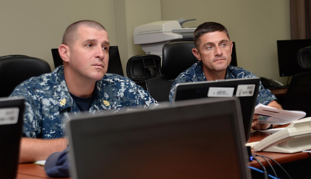 Lt. Cmdr. Kenneth Shaw (right), officer in charge, and Chief Petty Officer Eric Jackson, Naval Branch Health Clinic-Albany, collaborate with Marine Corps Logistics Base Albany’s, installation emergency manager, chemical protection officer and state and local environmental control representatives to discuss the impact of the mosquito-borne, Zika. The teams met to develop countermeasures to reduce the mosquito larvae population, thereby reducing the potential for risk in the local area.
