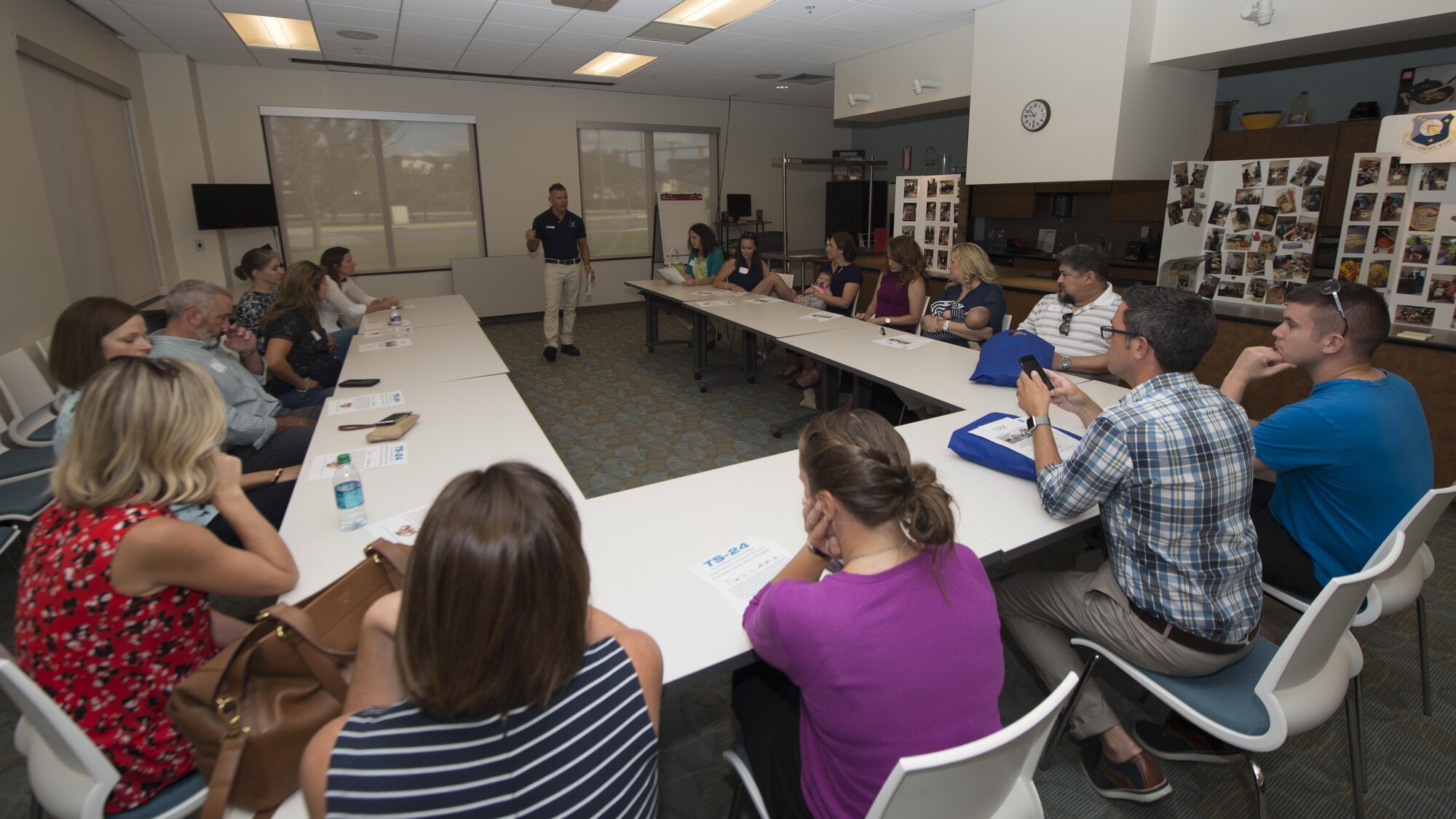 John Walters, 436th Force Support Squadron fitness program manager, briefs a group of Team Dover spouses on the Fitness Center’s services and availabilities during a spouses’ tour Sept. 7, 2016, at Dover Air Force Base, Del. As military dependents, these spouses have full access to the Fitness Center and all of its services. (U.S. Air Force photo by Senior Airman Zachary Cacicia)