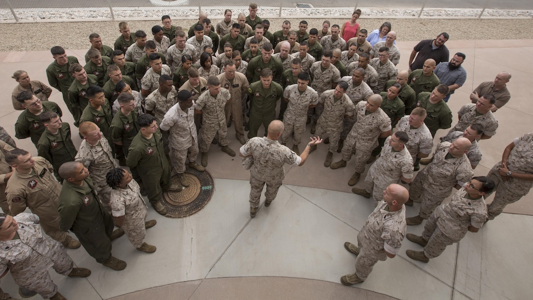 Commandant of the Marine Corps Gen. Robert B. Neller, center, speaks to Marines with VMX-1 at Marine Corps Air Station Yuma, Ariz., Sept. 13, 2016. Neller visited Yuma to meet with Marines and tour facilities.