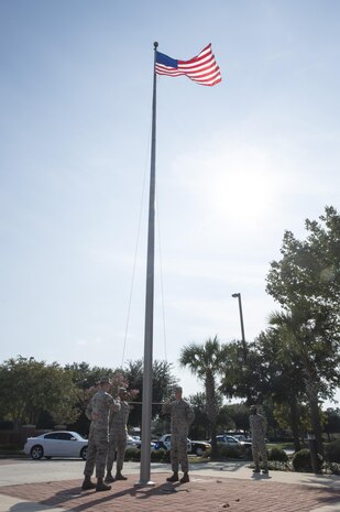 (From left to right) Joint Base Charleston Honor Guard members Airman 1st Class Court Brennan, Senior Airman Cornelius Grant, Airman 1st Class Alexander Klimek and Staff Sgt. Martegus Briggs participate in the Patriot Day retreat ceremony at Joint Base Charleston, South Carolina, Sept. 9, 2016. Patriot Day is a day of remembrance for those who lost their lives in the terrorist attacks on Sept. 11, 2001. 