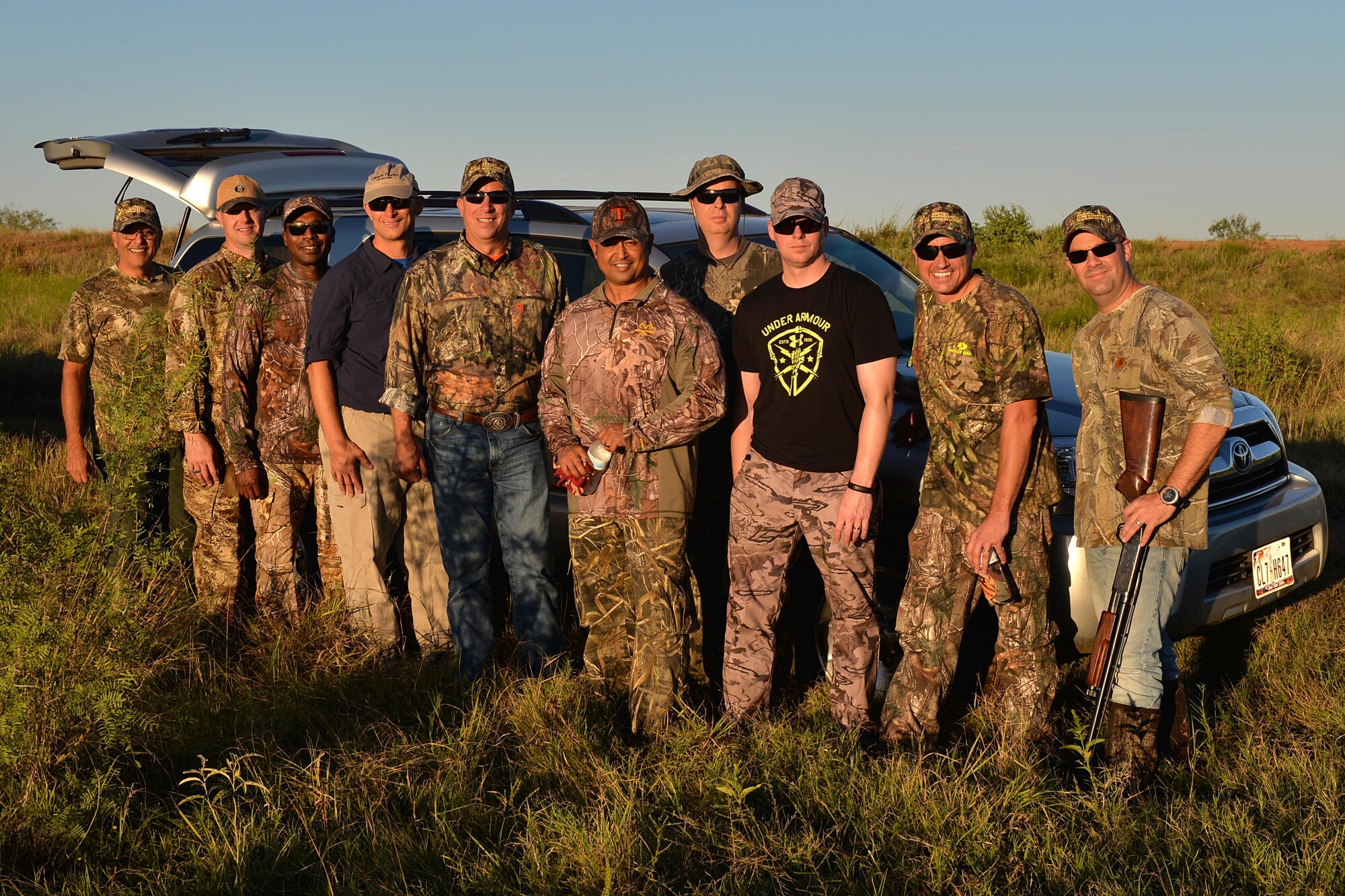 Brig. Gen. Patrick Doherty, 82nd Training Wing commander, and Chief Master Sgt. Joseph Pritchard, 82nd TRW command chief, stand with base leadership after their dove hunt in Henrietta, Texas, Sept. 10, 2016. Nearly 175 Airmen were invited to the 12th Annual Clay County Dove Salute at the Birdwell and Clark Ranch. (U.S. Air Force photo by Senior Airman Kyle E. Gese)