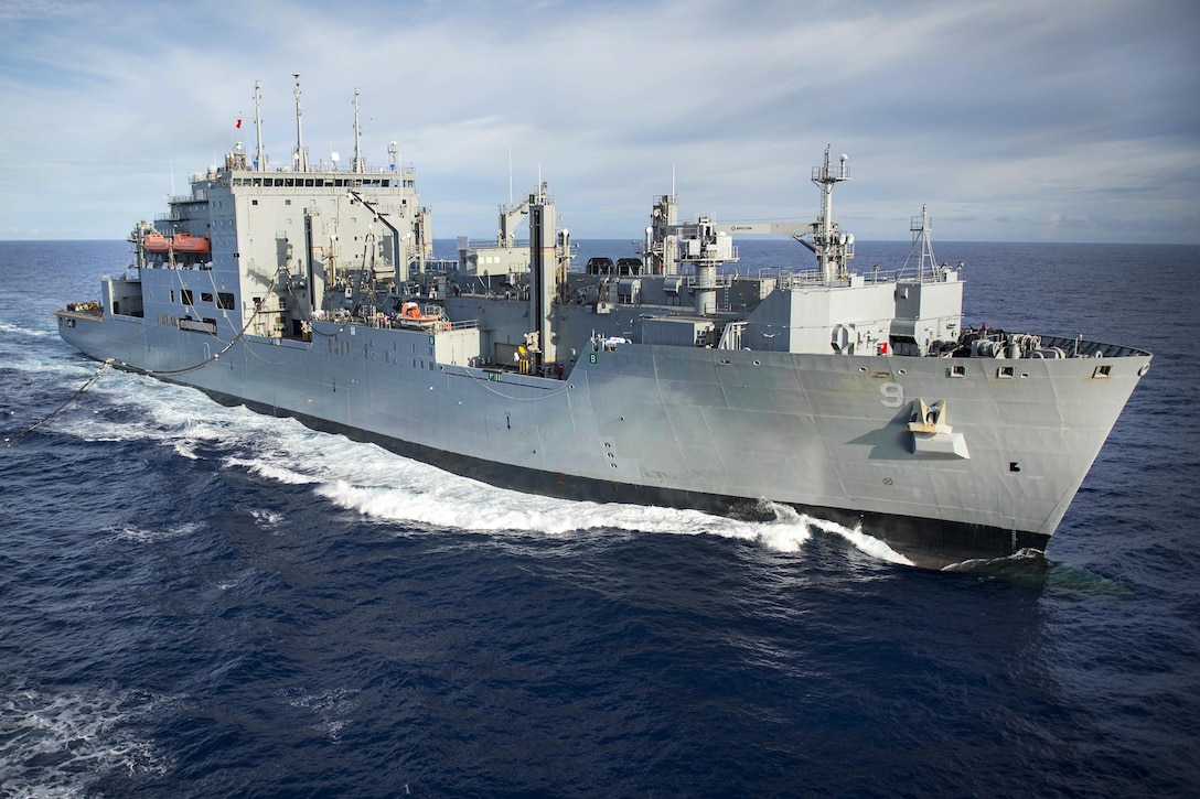 The dry cargo ship USNS Matthew Perry prepares to refuel the hospital ship USNS Mercy, not shown, during a replenishment at sea in the Pacific Ocean, Sept. 10, 2016. Deployed in support of Pacific Partnership 2016, Mercy was sailing to her home port of San Diego. Navy photo by Petty Officer 3rd Class Trevor Kohlrus