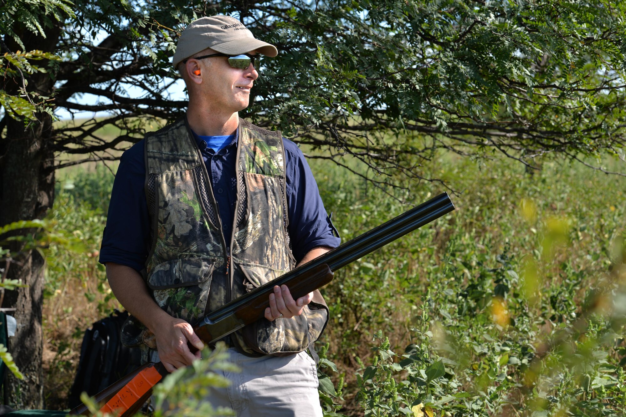 Col. Timothy Gillaspie, 82nd Training Wing vice commander, waits to hunt dove during the 12th Annual Clay County Dove Salute in Henrietta, Texas, Sept. 10, 2016. Gillaspie, along with nearly 175 other Airmen, were invited to the Birdwell and Clark Ranch to hunt dove through the evening and stay for a steak dinner held at the ranch. (U.S. Air Force photo by Senior Airman Kyle E. Gese)