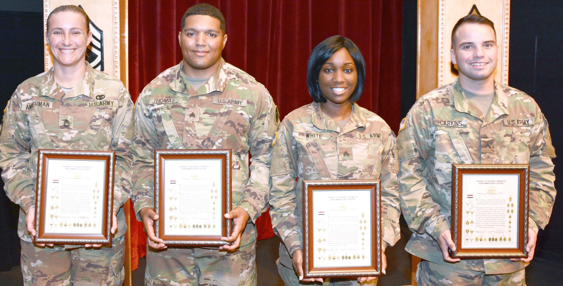(From left) Staff Sgt. Shelly Ammerman, Sgt. Ernest Thomas, Sgt. Sharonica White and Cpl. Anthony Carkins from the 187th Medical Battalion pose after their induction as noncommissioned officers during a ceremony at the Fort Sam Houston Theater Sept. 1.
