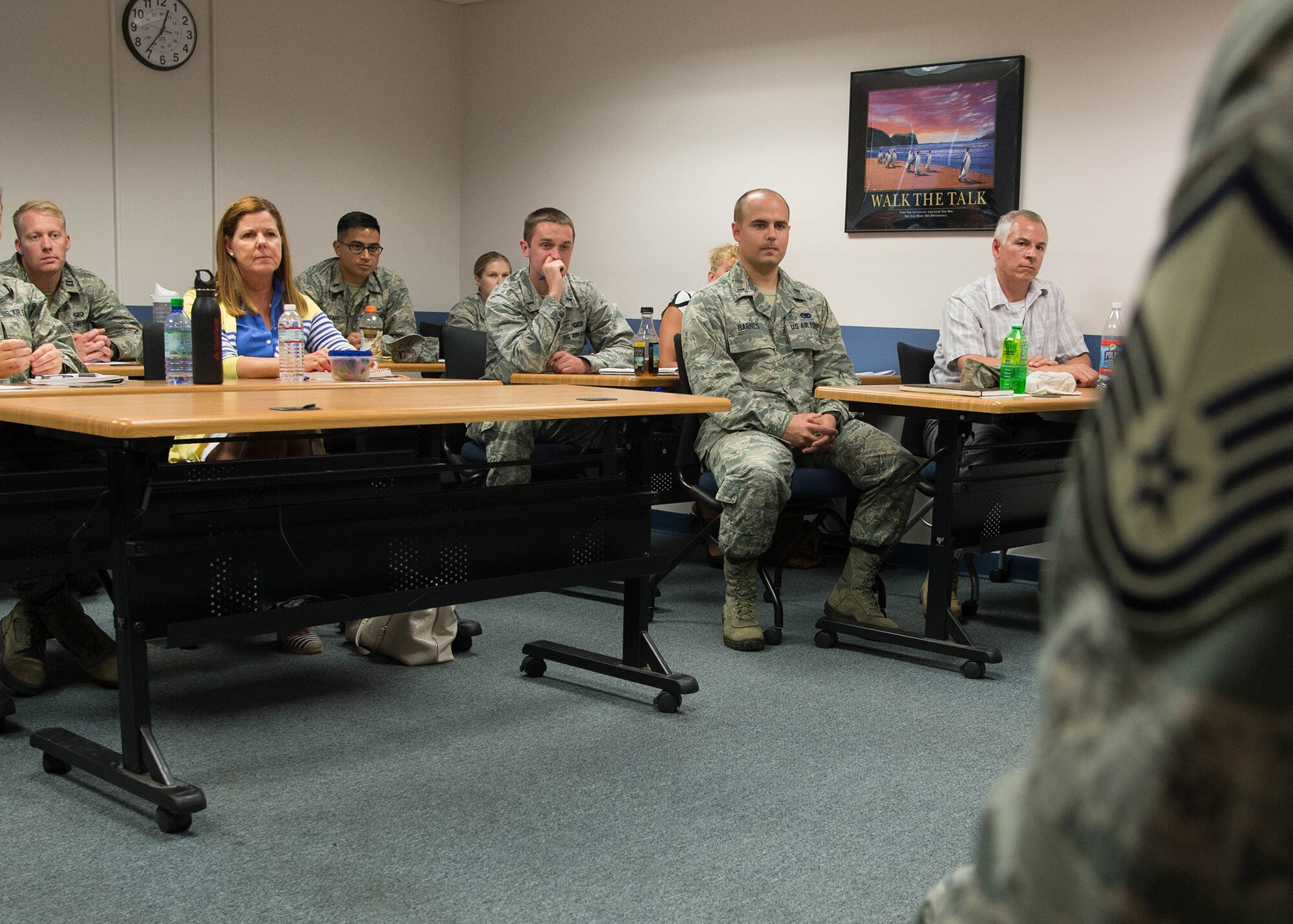 Junior officers and civilian employees listen as senior noncommissioned officers share their experiences during a panel discussion at base education center Sept. 13. The panel, Mentoring New Flight Commanders and the Senior NCO’s role, was part of a three-day Flight Commanders Course hosted by the Hanscom Company Grade Officer Council. (U.S. Air Force photo by Jerry Saslav)