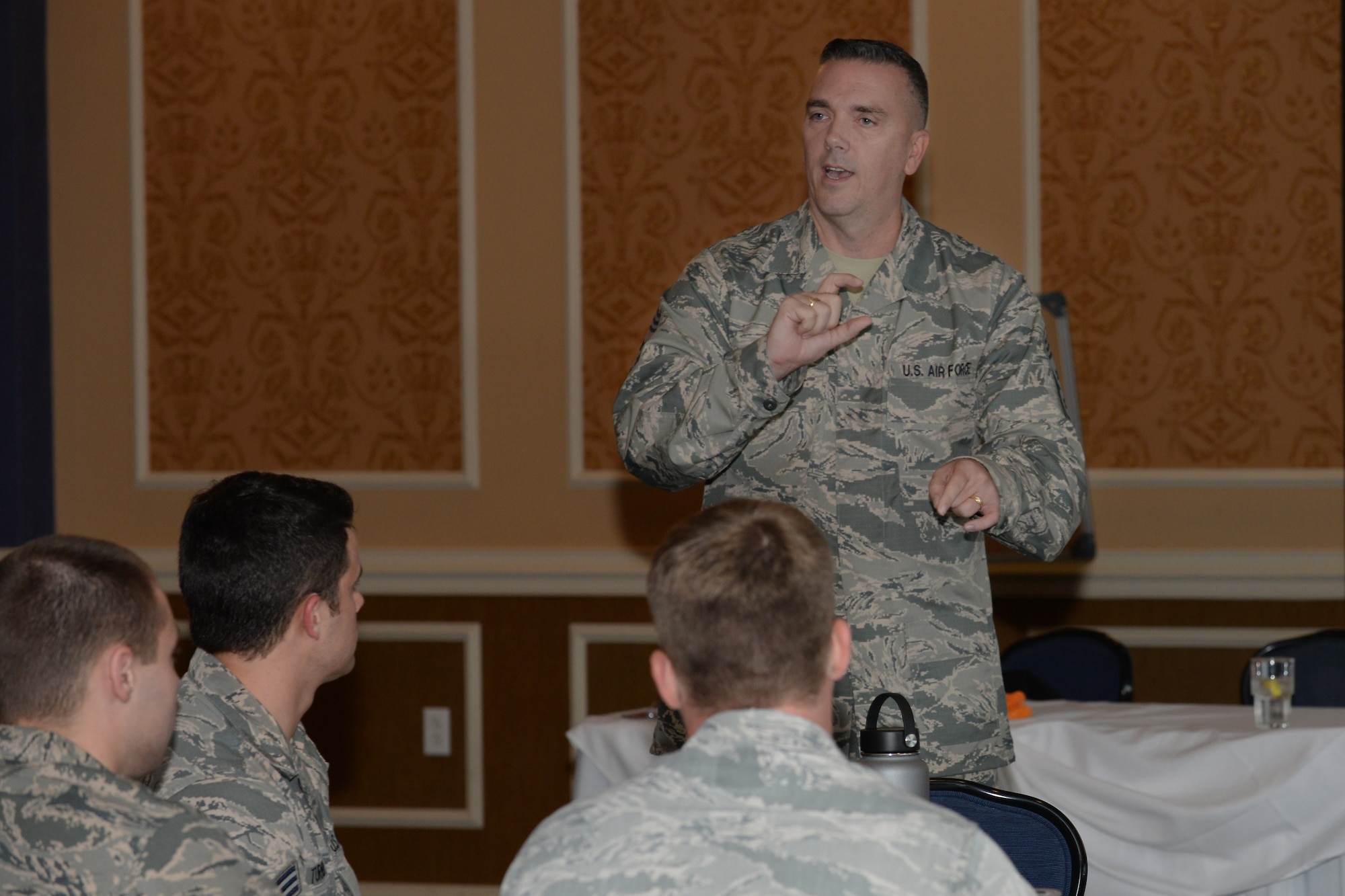U.S. Air Force John Thompson Jr., 480th Intelligence, Surveillance and Reconnaissance Wing command chief, talks to staff sergeant selects during the Joint Base Langley-Eustis NCO transition course at Joint Base Langley-Eustis, Va., Sept, 8, 2016. The course ran in conjunction with the installation’s first ever NCO induction ceremony. (U.S. Air Force photo by Staff Sgt. Teresa J. Cleveland)