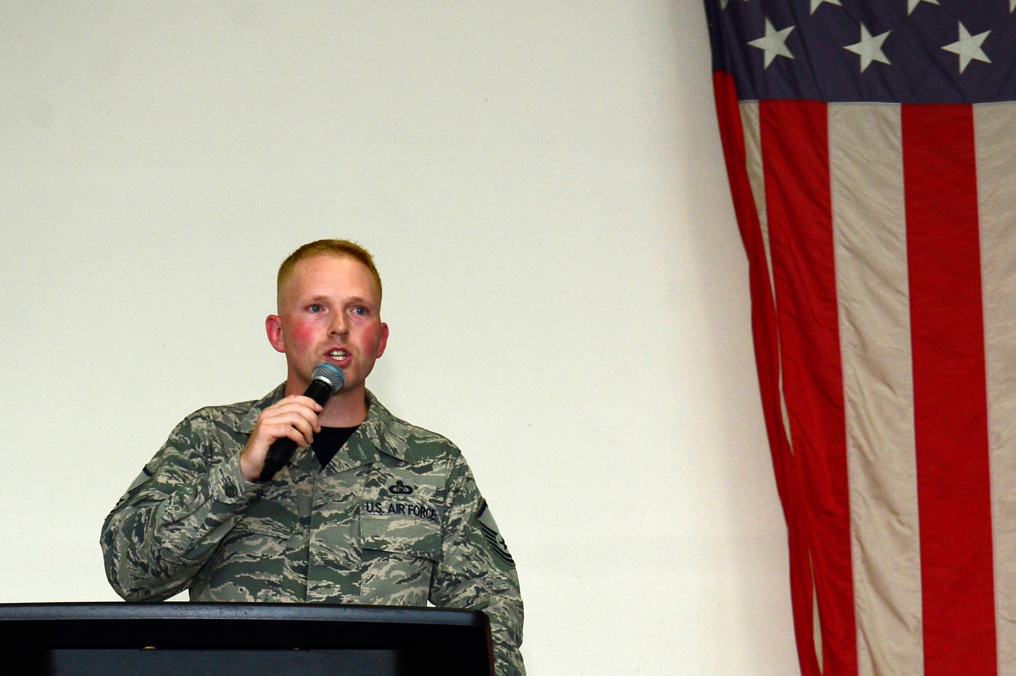 U.S. Air Force Master Sgt. Jeffrey Vogel, 1st Operational Support Squadron command post superintendent, provides the newly inducted staff sergeant selects advice on leadership as the guest speaker for the first NCO induction ceremony at Joint Base Langley-Eustis, Va., Sept. 9, 2016. Vogel spoke of finding passion in leading and explained that NCOs are the backbone of the Armed Forces. (U.S. Air Force photo by Airman 1st Class Kaylee Dubois)