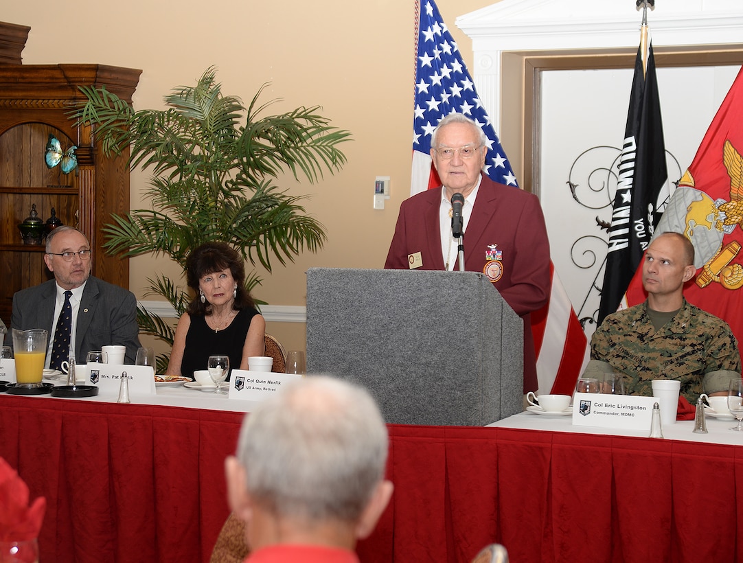 Retired Army Col. Quin Herlik, former Prisoner of War, speaks during the POW/MIA recognition breakfast at the Town and Country Grand Ballroom, aboard Marine Corps Logistics Base Albany, Sept. 9.