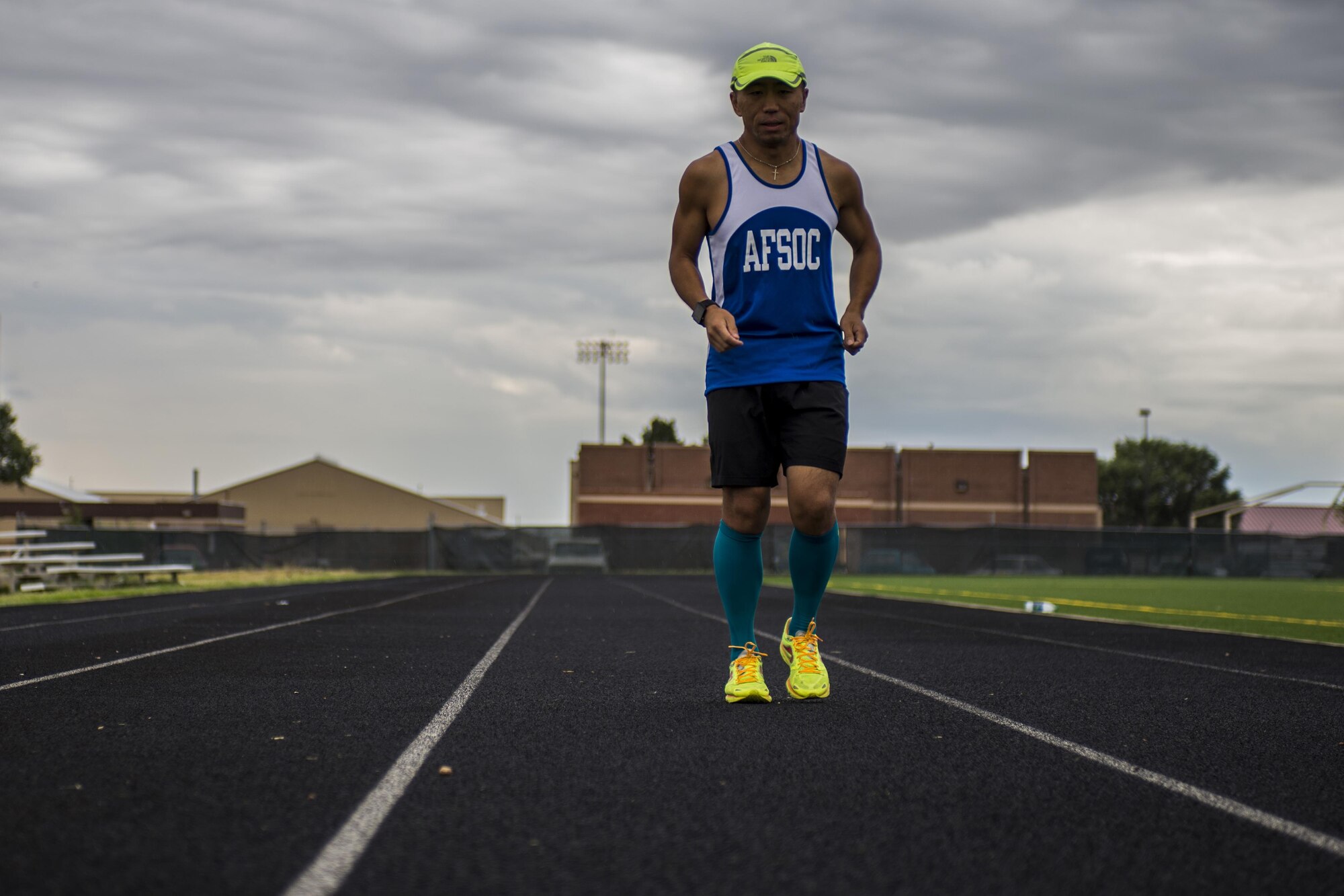 Tech. Sgt. Ming Ni, 27th Special Operations Logistics Readiness Squadron Fleet Management and Analysis, runs on the track Sept. 6, 2016 at Cannon Air Force Base, N.M. Ni is scheduled to represent Air Force Special Operations Command in the Air Force Marathon at Wright-Patterson Air Force Base, Ohio., Sept. 17, 2016. (U.S. Air Force Photo/Tech. Sgt. Manny Martinez)