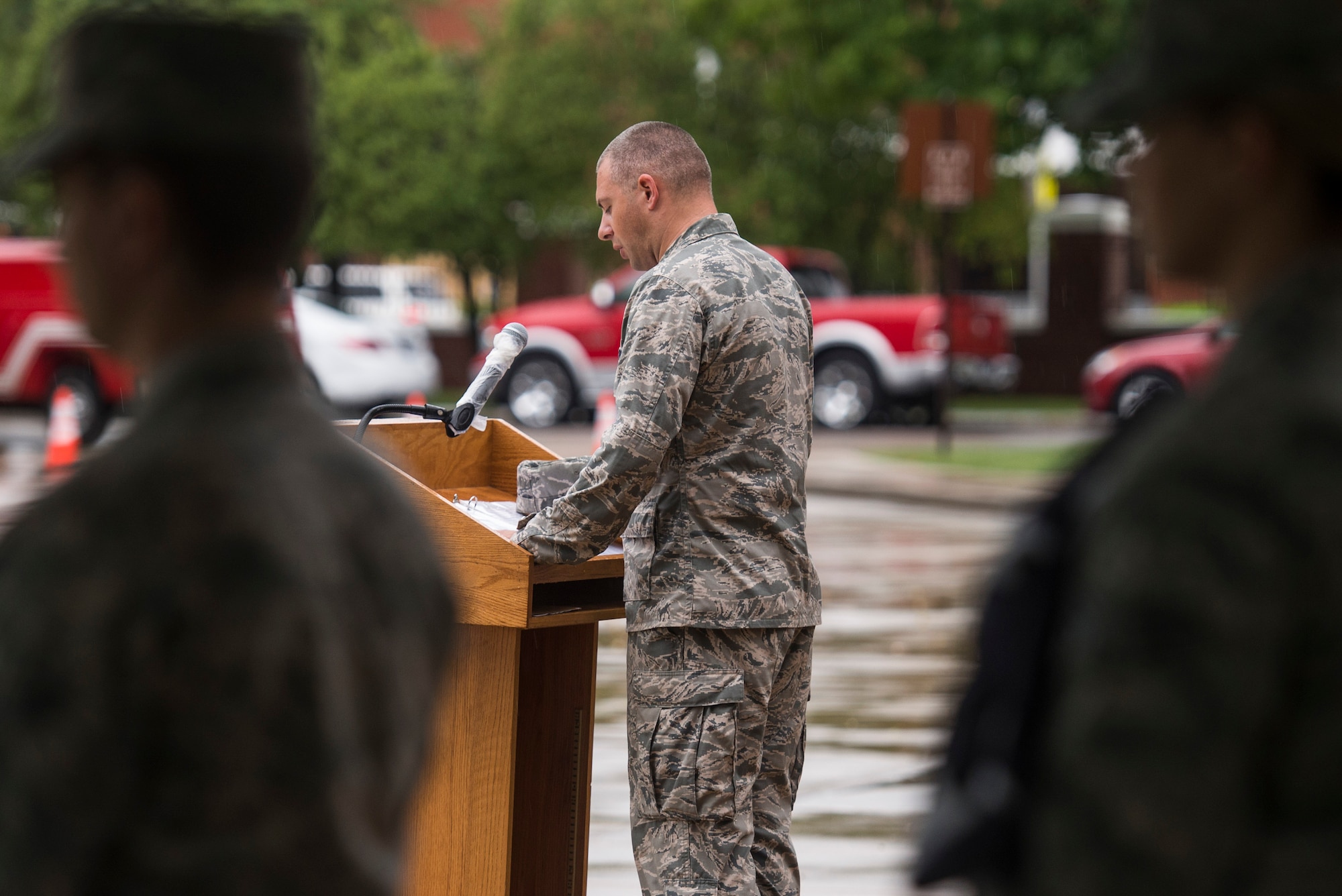 Ch. Brent Mulder (Capt.), 375th Air Mobility Wing, speaks to those in attendance for Reveille, Scott Air Force Base, Ill., Sept. 9, 2016. (U.S. Air Force photo/Staff Sgt. Jodi Martinez)