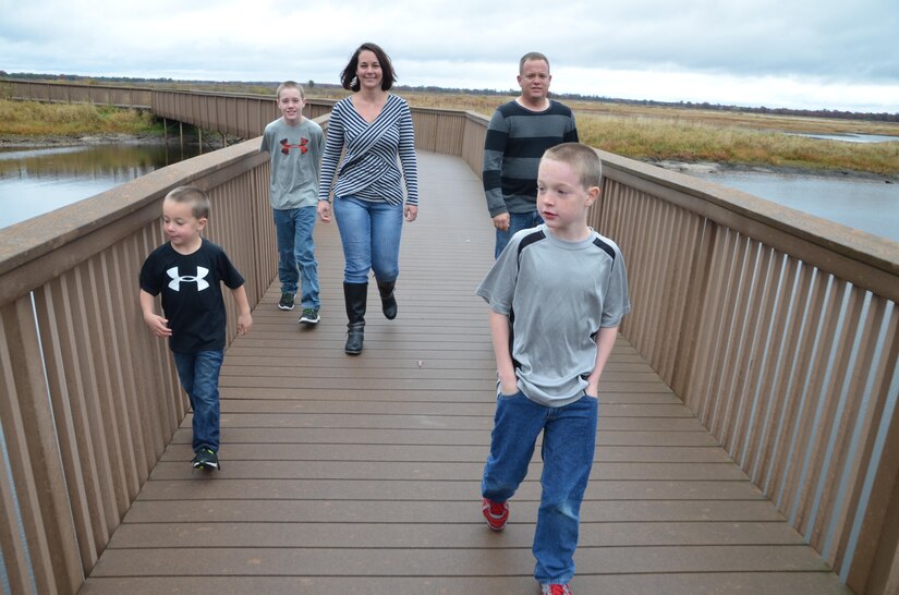 Bryan and Rachelle Witherow pose for a family photo with their children in the Fall of 2015. (Photo courtesy of Catherine Threat)