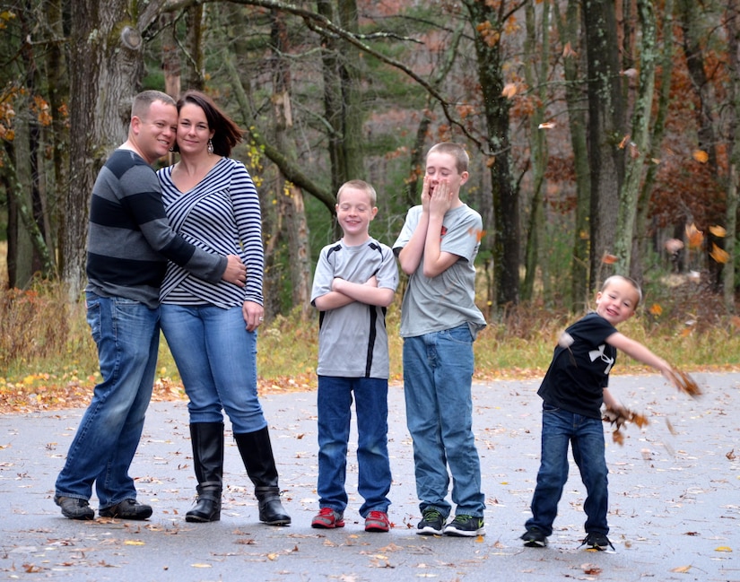 Bryan and Rachelle Witherow pose for a family photo with their children in the Fall of 2015. (Photo courtesy of Catherine Threat)