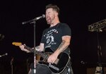 David Cook, American Idol Season 7 winner, performs a concert for members of the Joint Base San Antonio community at the JBSA-Lackland Amphitheater Sept. 9. While at JBSALackland, Cook visited various areas of the 502nd Air Base Wing and 37th Training Wing to learn about the missions at JBSA.