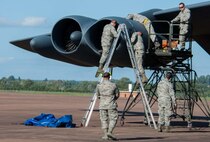 U.S. Air Force airmen from the 307th Bomb Wing and 2nd Bomb Wing work together to thoroughly inspect a B-52H Stratofortess after its landing at Royal Air Force Base Fairford, England, Sept. 8, 2016.  The team, comprised of reserve and active-duty components regularly work together as part of the Total Force Integration program. The team deployed to RAF Fairford to participate in Exercise Ample Strike, a Czech Republic led, 18 nation live exercise. (U.S. Air Force photo by 1st Lt. Monique Roux/Released)