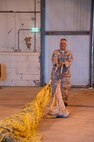 U.S. Air Force Master Sgt. Brad Schoth, 307th Bomb Wing aircraft flight equipment specialist, stretches out a 90-foot long parachute at Royal Air Force Fairford, England, Sept. 8, 2016. Schoth is deployed to RAF Fairford to participate in Exercise Ample Strike, a Czech Republic led, 18 nation live exercise. (U.S. Air Force photo by 1st Lt. Monique Roux/Released)