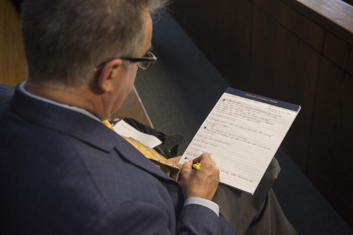 John Moran, Assistant Director of Training for the Department of Justice, takes notes during the multiservice DOJ conference here, Sept. 9, 2016. The training was held so judge advocates could help defend active duty, guardsmen, reservists and veterans alike under the Servicemembers Civil Relief Act and the Uniformed Services Employment and Reemployments Rights Act. These laws help protect them from negative treatment from their employers due to their service.
