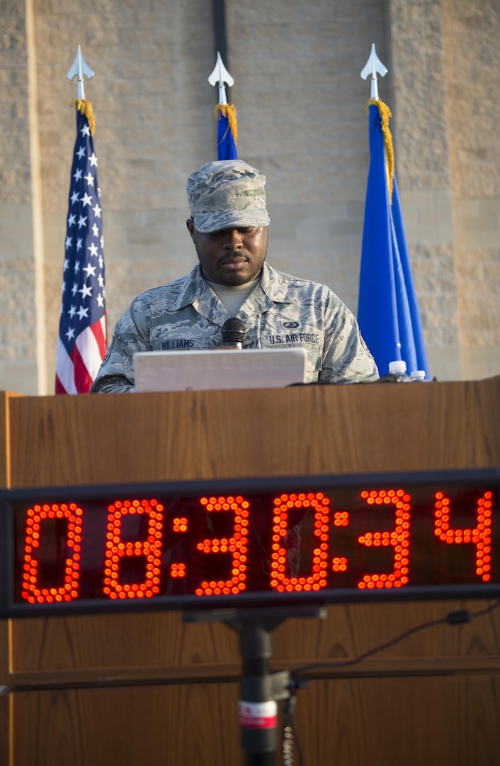 Senior Airman Terence Williams, 772 Enterprise Sources Squadron contract specialist, reads the names, ages and hometowns of the victims of the Sept. 11, 2001, during the 9/11 Commemorative Run Sept. 6, 2016, at Joint Base San Antonio-Lackland Medina Annex, Texas.